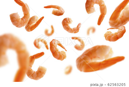 Boiled prawns levitate on a white background 62563205