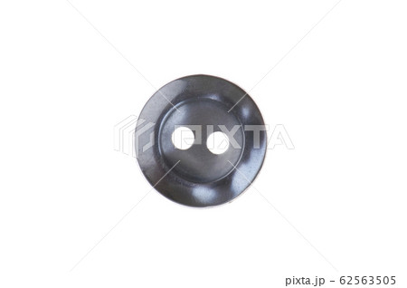 sewing button on white 62563505