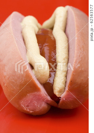 sausage with ketchup and mustard macro 62563577