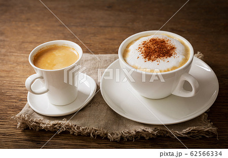 cup of cappuccino and cup of coffee cup of cappuccino and cup of coffee 62566334