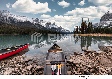 Canoe anchored on Spirit Island with Canadian 62568528