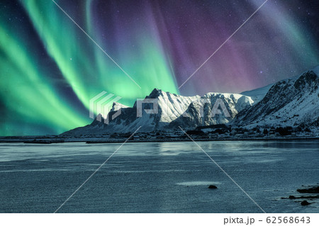Aurora Borealis, Northern Lights Above of snowy Aurora Borealis, Northern Lights Above of snowy 62568643
