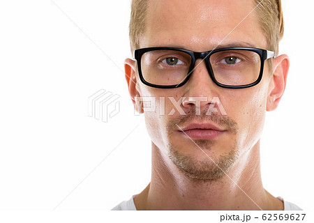 Close up of young handsome man wearing eyeglasses 62569627