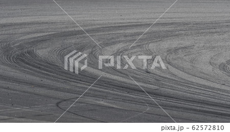 Asphalt race track detail with tire mark 62572810