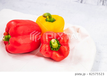 Fresh paprika on the wooden background Fresh paprika on the wooden background 62575523