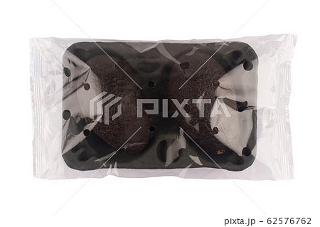 ripe avocado in dark cardboard packaging 62576762