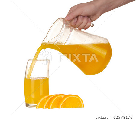 pouring Orange juice and slices of orange isolated 62578176