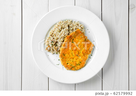 Top view of schnitzel with green buckwheat Top view of schnitzel with green buckwheat 62579992