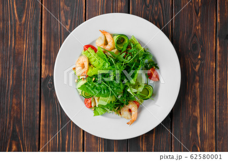 Overhead view of salad with shrimps, squid, Overhead view of salad with shrimps, squid, 62580001