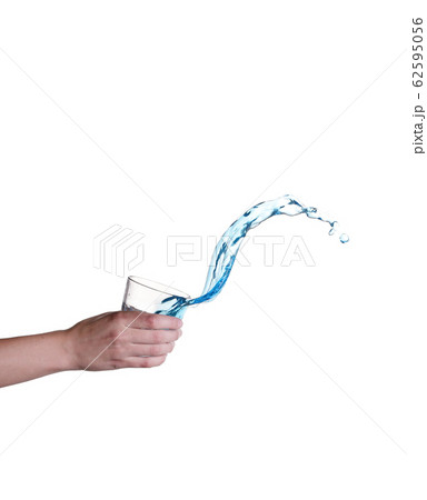 Blue water splashing in glass held by hand, white Blue water splashing in glass held by hand, white 62595056