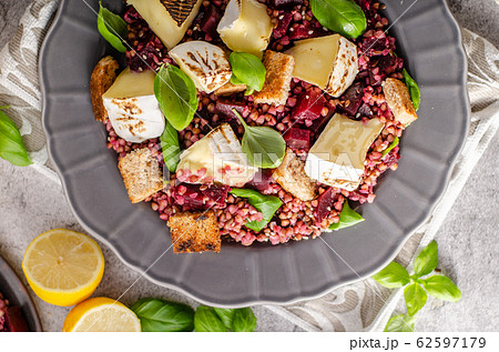 Grilled fish with salad 62597179