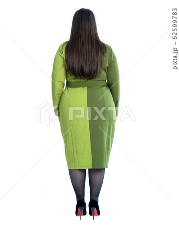 Plus Size Model with long hair posing in studio 62599783