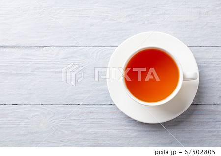 Cup of tea on a grey wooden background. Copy space. Top view. 62602805
