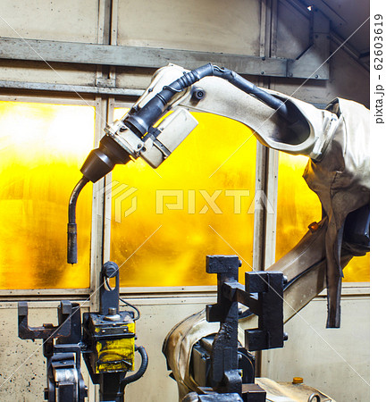 Welding robots in factories industrial Welding robots in factories industrial 62603619