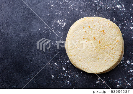 Tortillas, flat breads on dark grey background. Copy space. Top view. 62604587