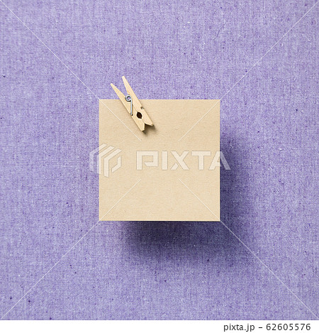 Empty memo paper, sticky notes on purple fabric background 62605576