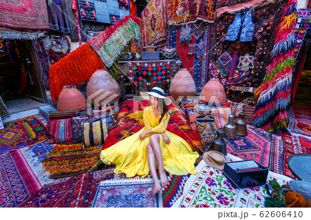 Beautiful girl at traditional carpet shop in Goreme city, Cappadocia in Turkey. 62606410
