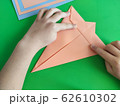 Origami step by step. How to make a paper bunny for Easter greetings 62610302