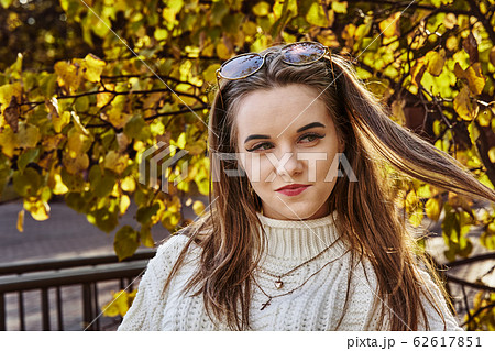 Portrait of a young woman with long blond hair  62617851