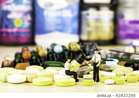 Drug prescription for treatment medication. Pharmaceutical medicament, cure in container for health. Pharmacy theme, capsule pills with medicine antibiotic in packages.closeup,Medicine or capsules. 62622200