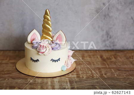 Beautiful bright cake in the form of a unicorn 62627143