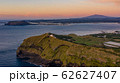 Aerial View of Udo Peak, Seongsan Ilchulbong Tuff Cone and Hallasan Mountain, Sunrise Time  62627407