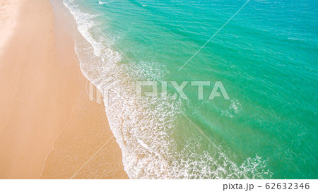 Top view aerial image from drone of an stunning beautiful sea landscape beach with turquoise water with copy space for your text.Beautiful Sand beach with turquoise water,aerial UAV drone shot 62632346