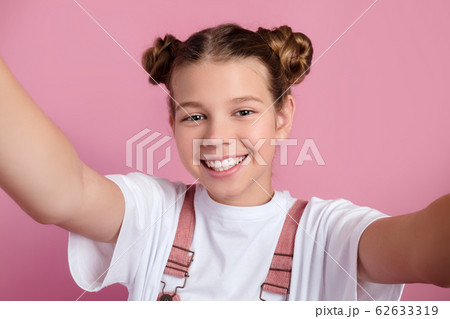 Close-up of young funny woman taking selfie Close-up of young funny woman taking selfie 62633319