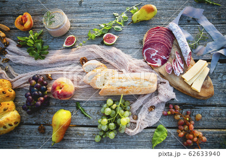 Picnic on the beach at sunset in boho style. Top Picnic on the beach at sunset in boho style. Top 62633940