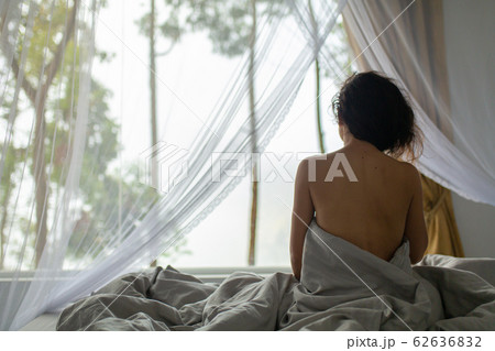 Tender young girl wakes up in the morning 62636832
