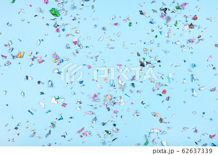 Multicolored confetti on blue background. 62637339
