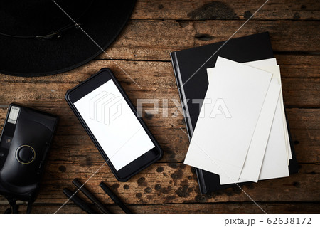 Smartphone white screen on wooden table. . Smartphone white screen on wooden table. . 62638172