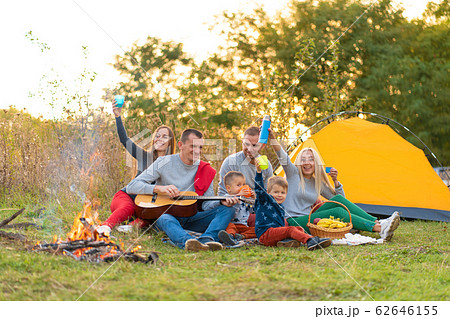 travel, tourism, hike, picnic and people concept - 62646155