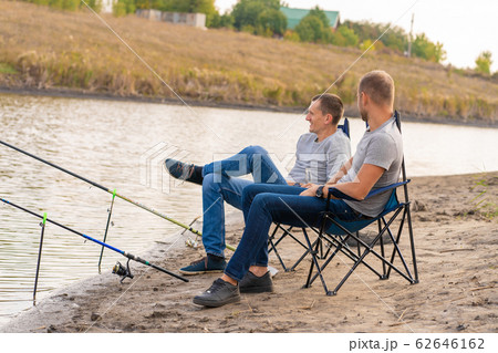 leisure and people concept. Happy friends with leisure and people concept. Happy friends with 62646162