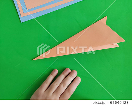 Origami step by step. How to make a paper bunny Origami step by step. How to make a paper bunny 62646423