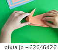 Origami step by step. How to make a paper bunny 62646426