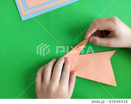 Origami step by step. How to make a paper bunny Origami step by step. How to make a paper bunny 62646428