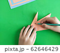 Origami step by step. How to make a paper bunny 62646429