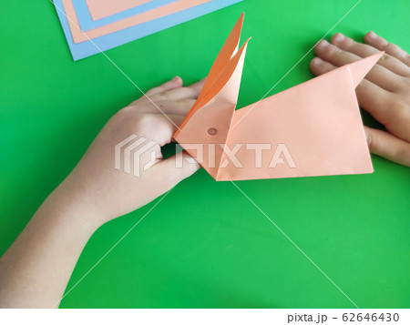 Origami step by step. How to make a paper bunny Origami step by step. How to make a paper bunny 62646430
