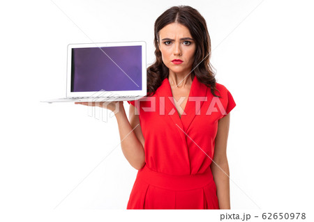 Portrait of nice caucasian girl works with laptop isolated on white background 62650978