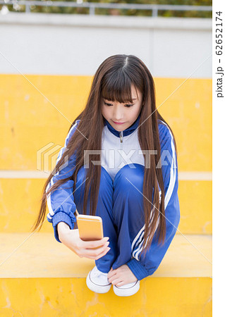 long-haired girl wearing school uniform 62652174