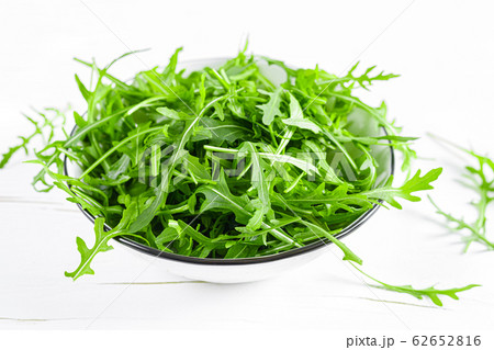 Fresh arugula or rocket leaves salad, rucola Fresh arugula or rocket leaves salad, rucola 62652816