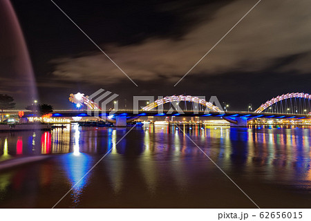 Illuminated Dragon bridge at night. Da Nang, Vietnam Illuminated Dragon bridge at night. Da Nang, Vietnam 62656015