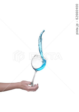 Blue alcoholic cocktail on white isolate splash 62660400