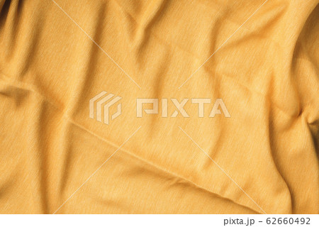Yellow fabric texture background. Top View of cloth textile surface. Abstract backdrop for design 62660492