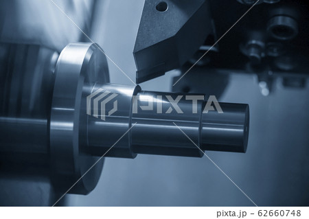 The CNC lathe machine in metal working process. 62660748
