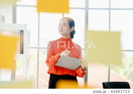 Business woman is reading documents view through 62661723