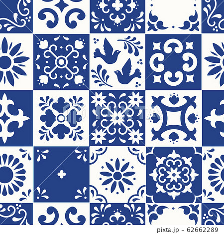 Mexican talavera seamless pattern. Ceramic tiles with flower, leaves and bird ornaments in traditional majolica style from Puebla. Mexico floral mosaic in classic blue and white. Folk art design. Mexican talavera seamless pattern. Ceramic tiles with flower, leaves and bird ornaments in traditional majolica style from Puebla. Mexico floral mosaic in classic blue and white. Folk art design. 62662289