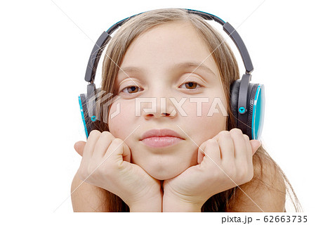 portrait of  little girl with blue headphone, on 62663735