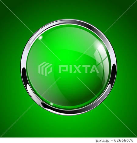 Green glass button with metal frame on green background 62666076